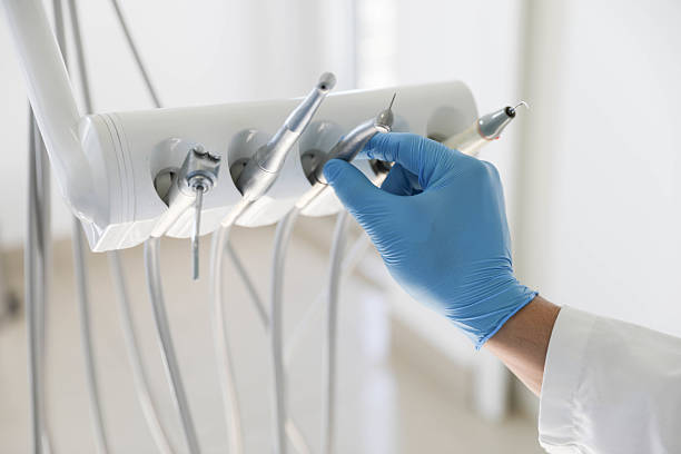 Professional Tooth Extraction technician working in Hayfield, VA